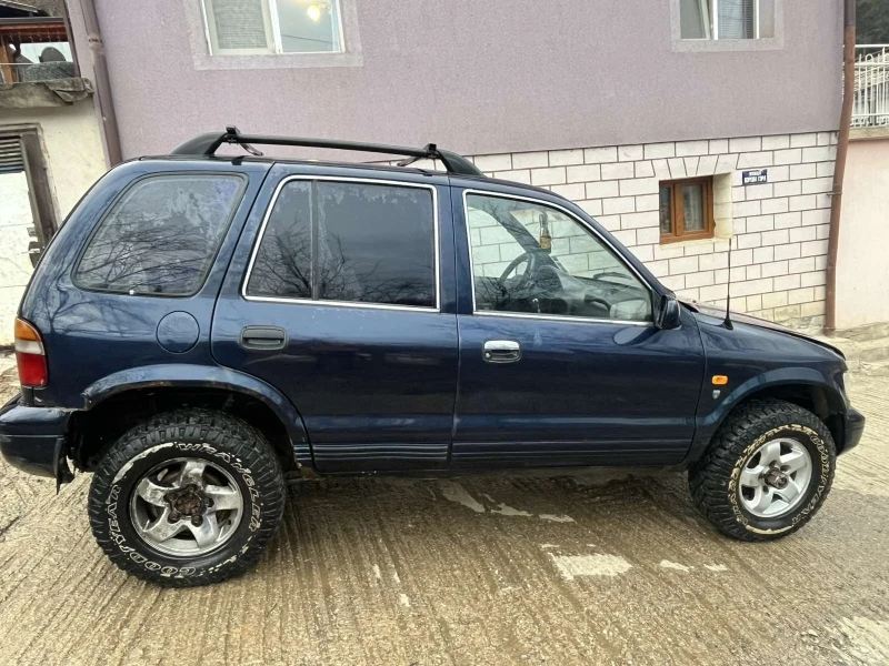 Kia Sportage 2.0 D, снимка 9 - Автомобили и джипове - 50380141
