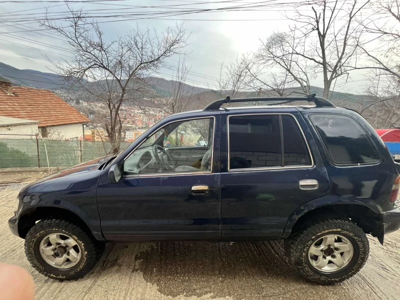 Kia Sportage 2.0 D, снимка 4 - Автомобили и джипове - 50380141