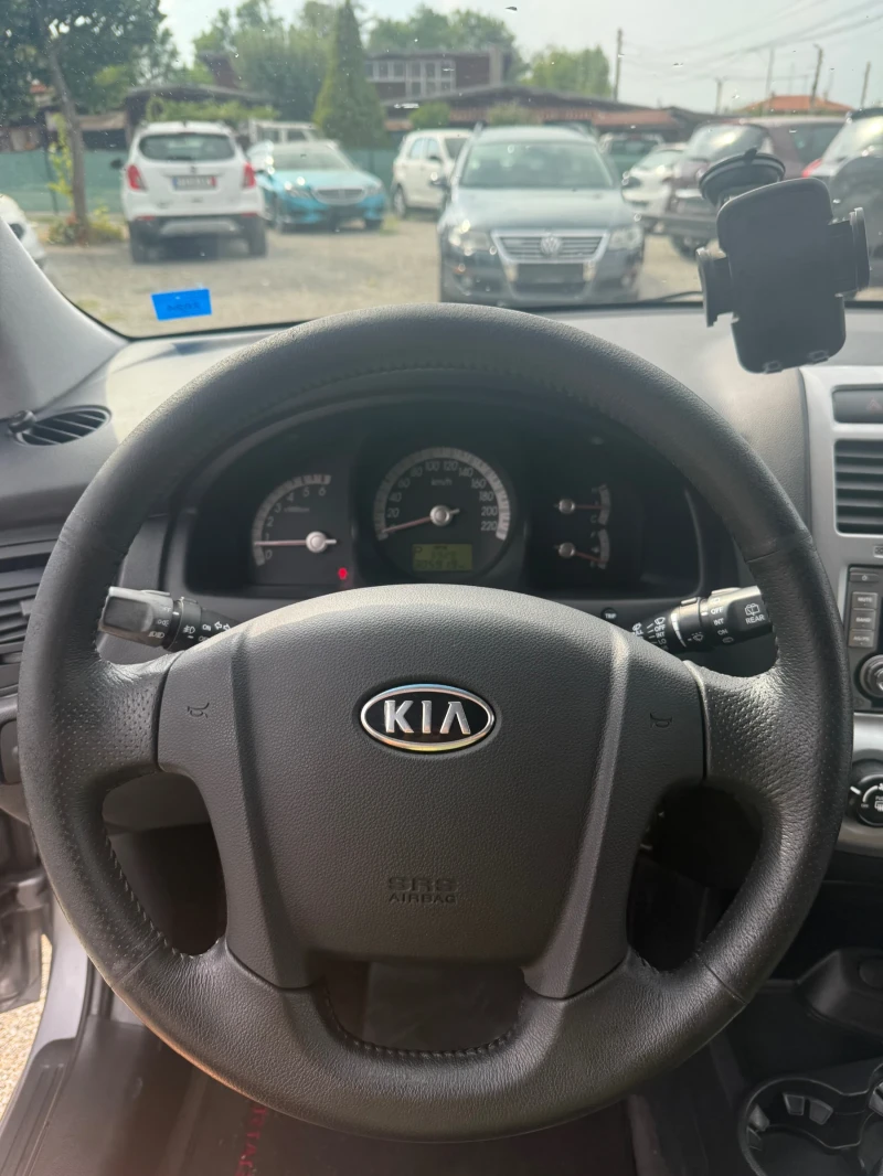 Kia Sportage 2.0, снимка 8 - Автомобили и джипове - 51417259