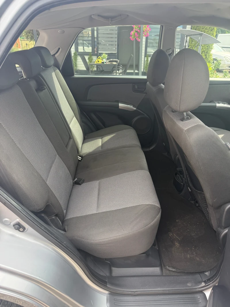 Kia Sportage 2.0, снимка 13 - Автомобили и джипове - 51417259