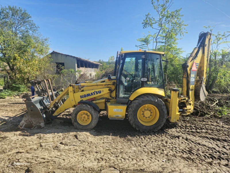 Багер Komatsu WB93R