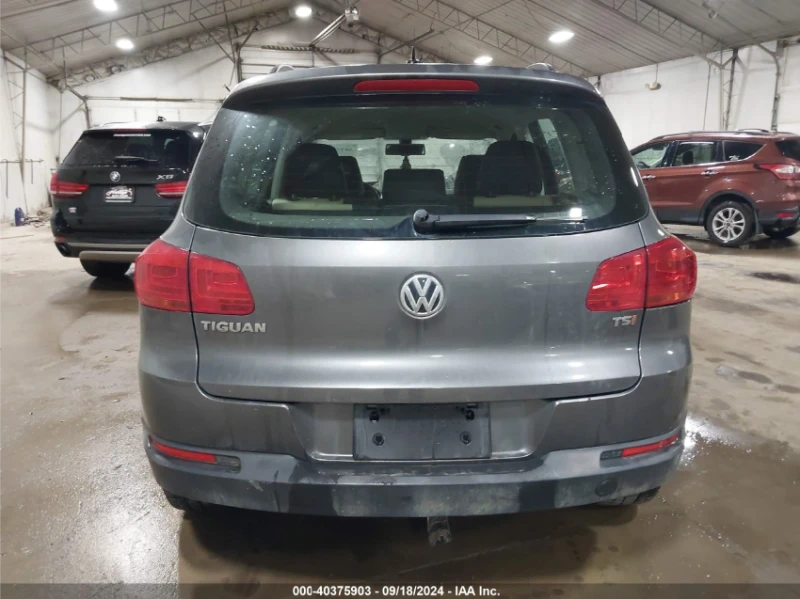 VW Tiguan, снимка 9 - Автомобили и джипове - 47714523