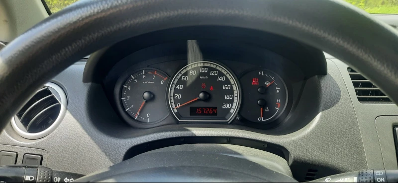 Suzuki Swift 1.3i, снимка 14 - Автомобили и джипове - 51692643