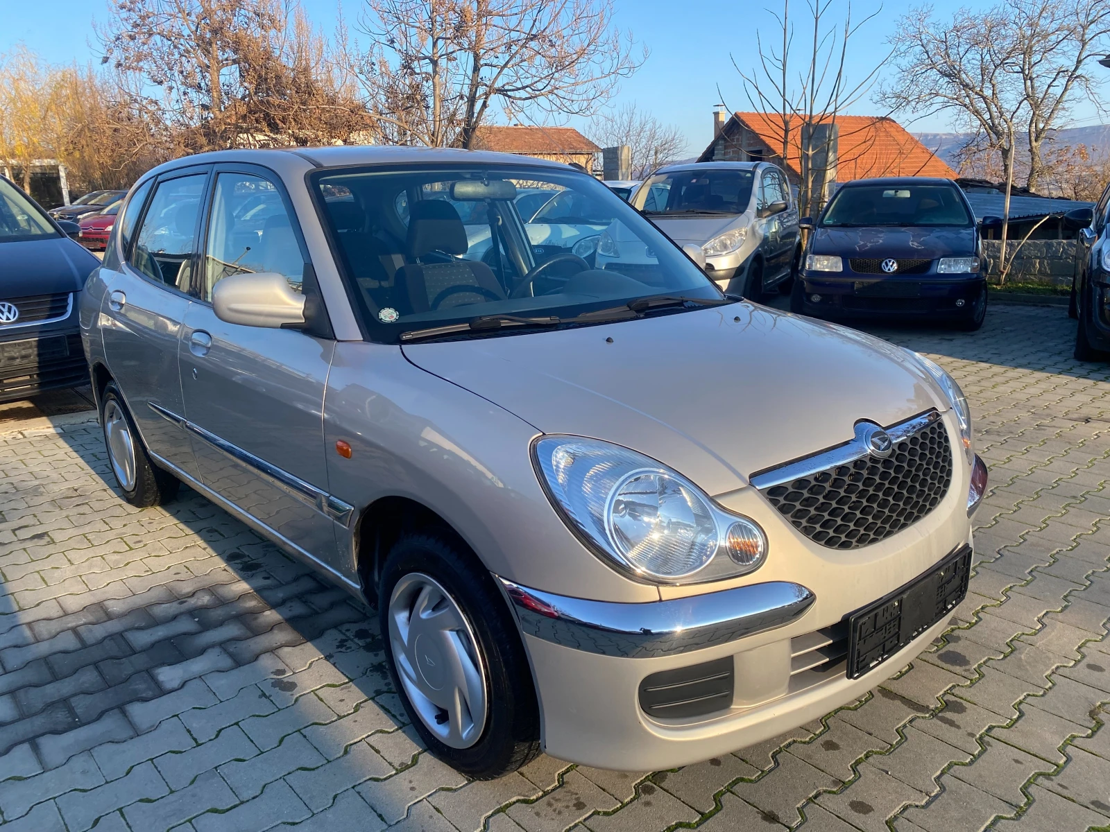 Daihatsu Sirion 1.0 58к.с - изображение 5