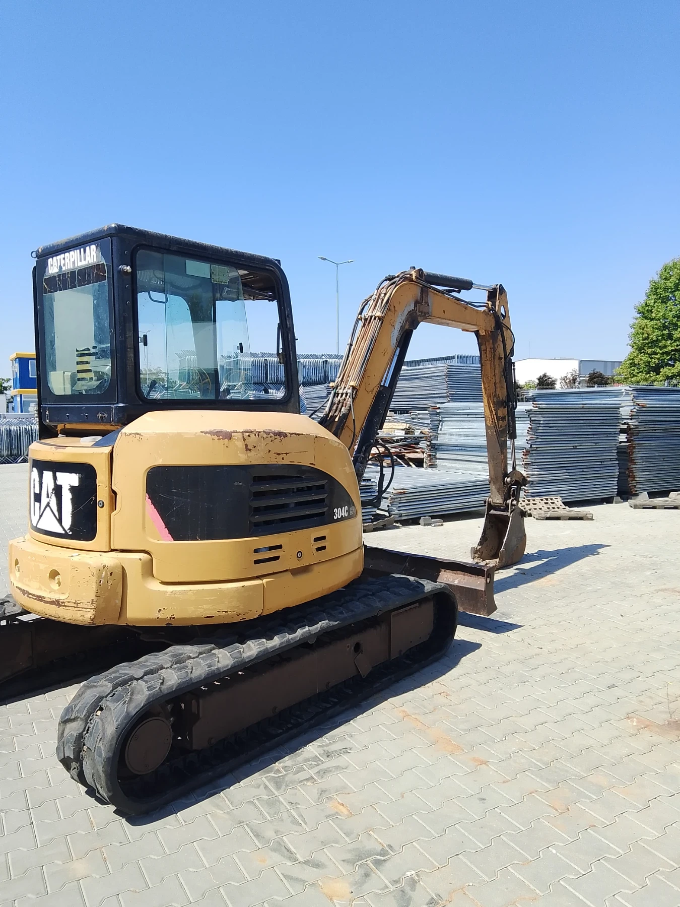 Багер Cat 304C