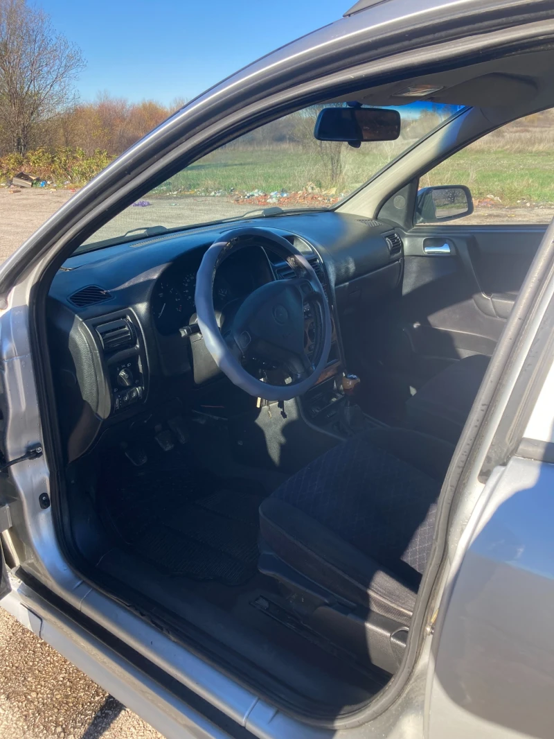 Opel Astra 1.4i 16v, снимка 9 - Автомобили и джипове - 52563987