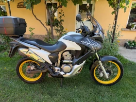 ������ Honda Xlv