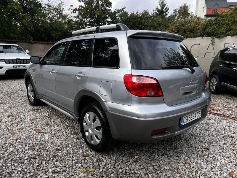 Mitsubishi Outlander 2.4i 4X4 - АВТОМАТИК - ГАЗОВ ИНЖЕКЦИОН!, снимка 6 - Автомобили и джипове - 47492441