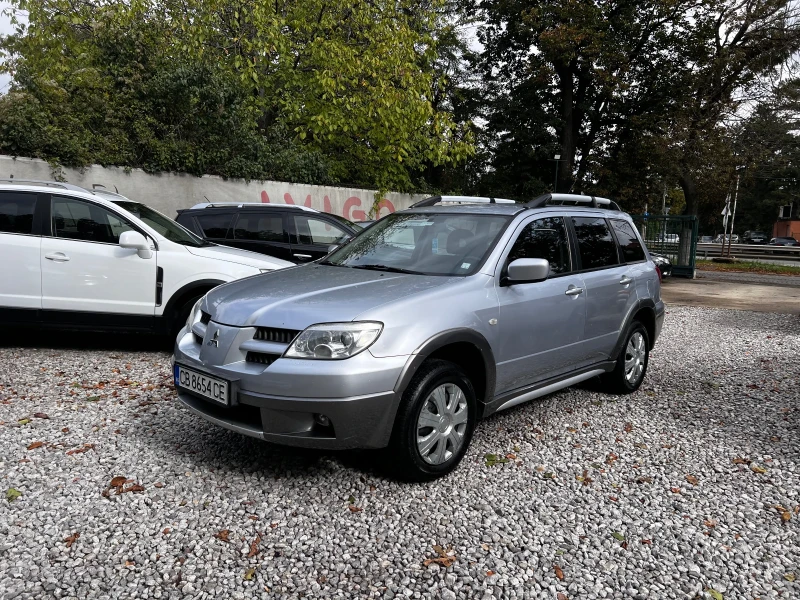 Mitsubishi Outlander 2.4i 4X4 - АВТОМАТИК - ГАЗОВ ИНЖЕКЦИОН!, снимка 1 - Автомобили и джипове - 47492441