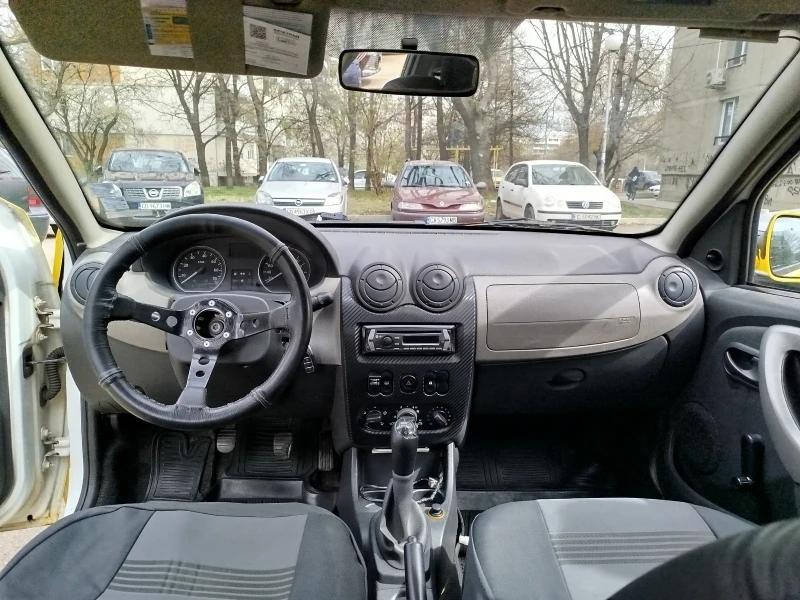 Dacia Sandero 1.4 8v, снимка 9 - Автомобили и джипове - 49604286