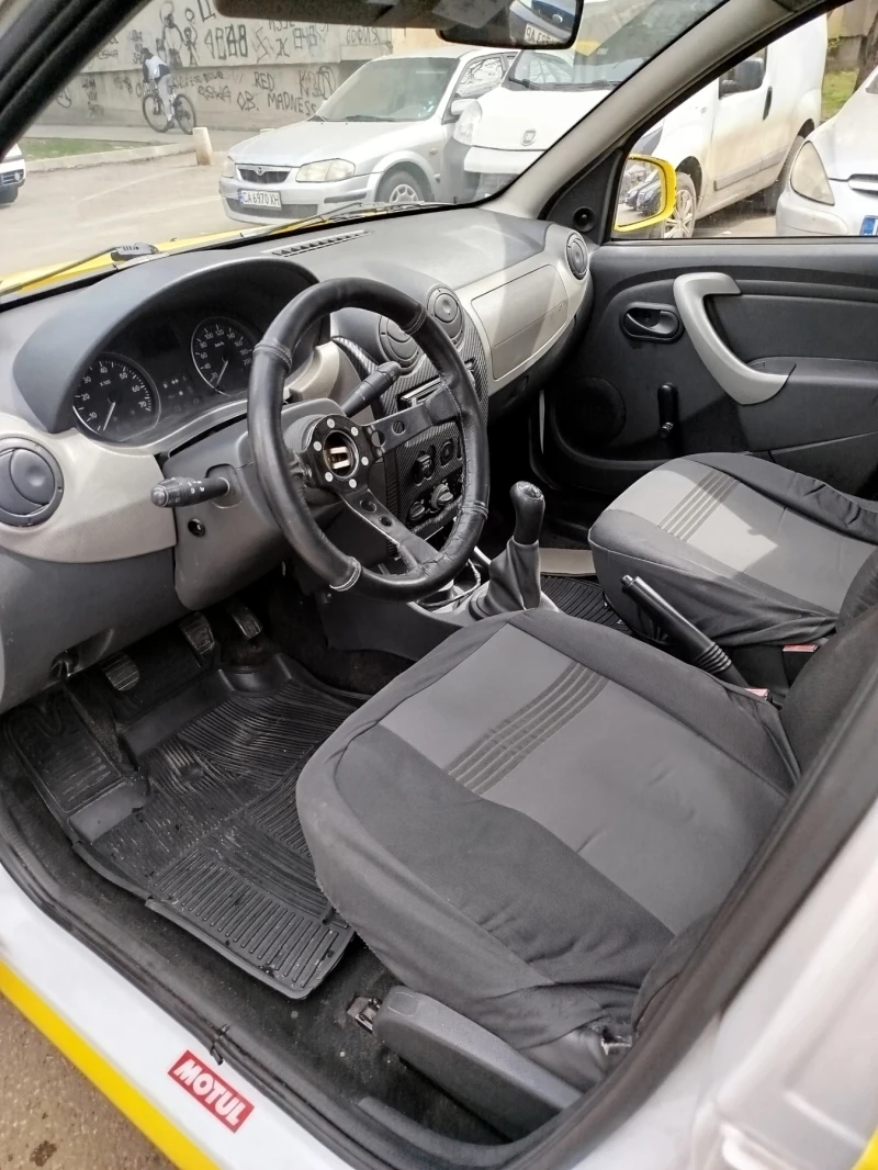 Dacia Sandero 1.4 8v, снимка 10 - Автомобили и джипове - 49604286