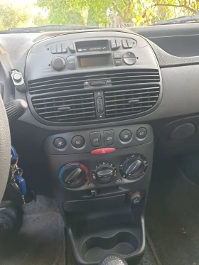 Fiat Punto 1.2 60 Климатик, снимка 12