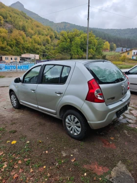 Обява за продажба на Dacia Sandero 1.4I КЛИМАТИК ~3 499 лв. - изображение 7