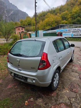 Обява за продажба на Dacia Sandero 1.4I КЛИМАТИК ~3 499 лв. - изображение 6