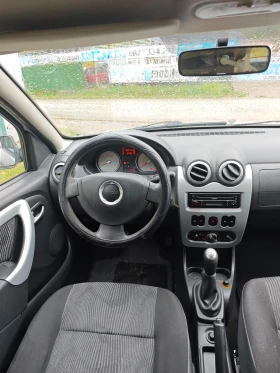 Обява за продажба на Dacia Sandero 1.4I КЛИМАТИК ~3 499 лв. - изображение 9