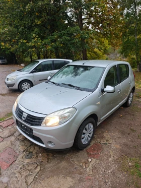 Обява за продажба на Dacia Sandero 1.4I КЛИМАТИК ~3 499 лв. - изображение 11