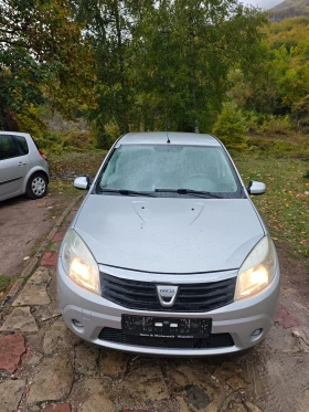 Обява за продажба на Dacia Sandero 1.4I КЛИМАТИК ~3 499 лв. - изображение 2