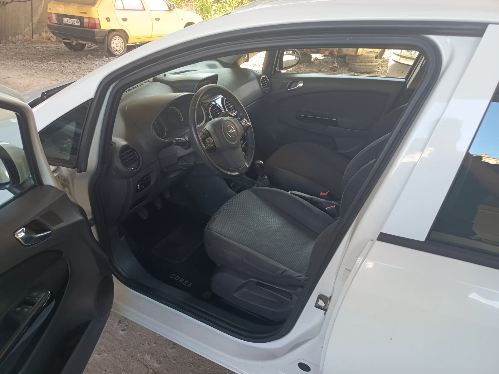 Opel Corsa 1.4 facelift, снимка 7 - Автомобили и джипове - 55353908