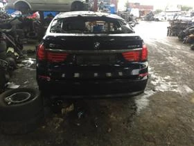     ,   BMW 5 Gran Turismo