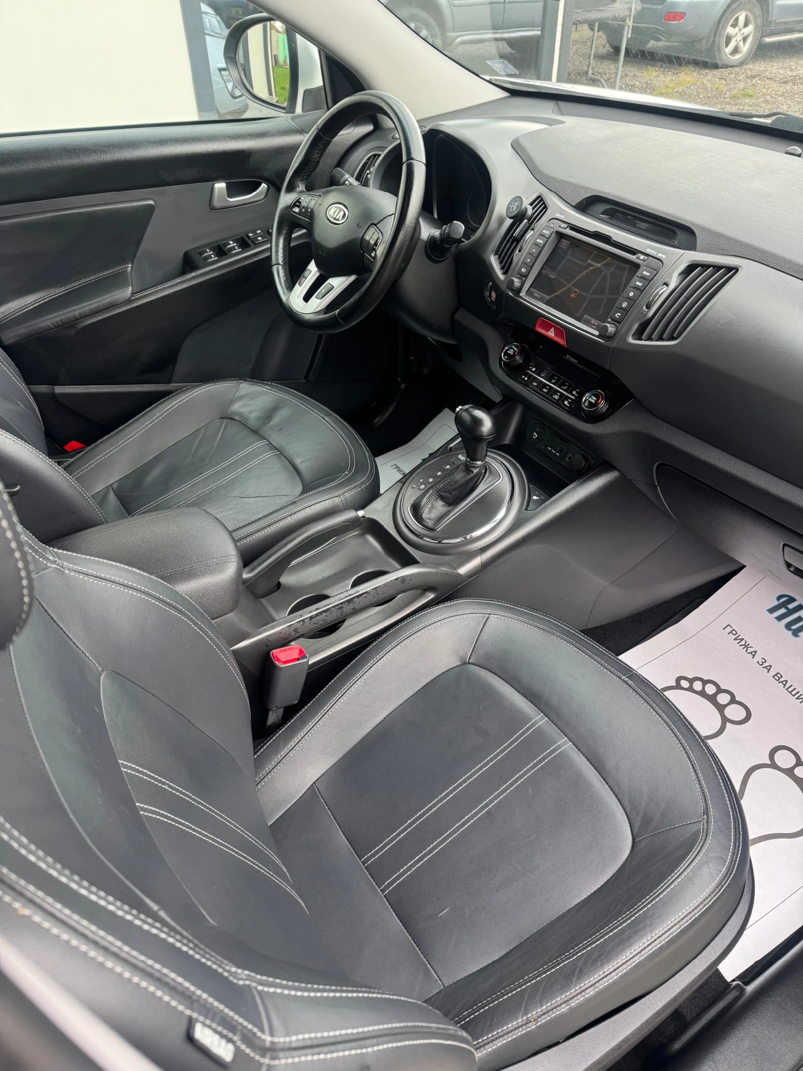 Kia Sportage 2.0i 4WD автомат, кожа, панорама, NAVI, ГАЗ, KEYS , снимка 17 - Автомобили и джипове - 55018245