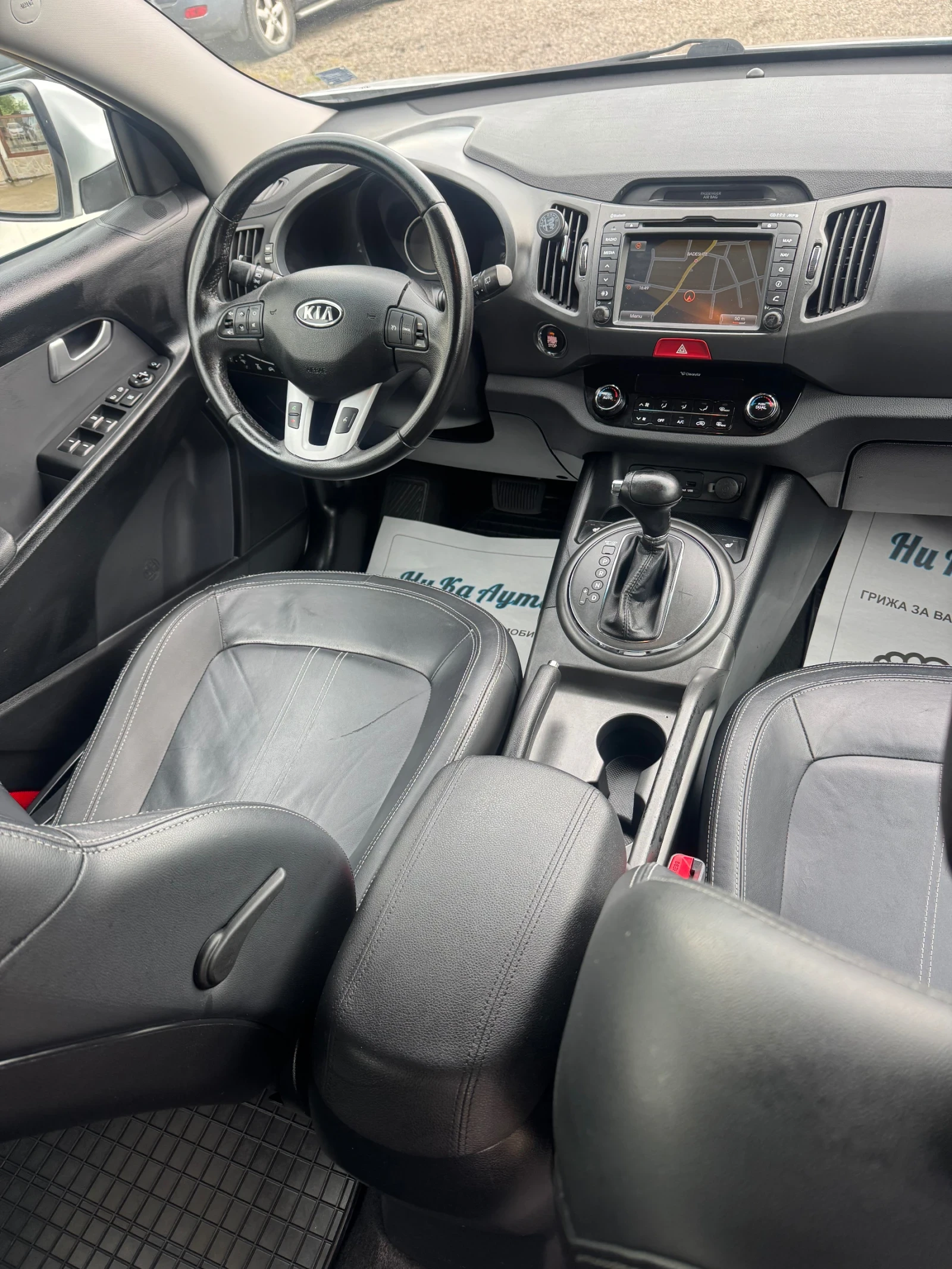 Kia Sportage 2.0i 4WD автомат, кожа, панорама, NAVI, ГАЗ, KEYS , снимка 13 - Автомобили и джипове - 55018245