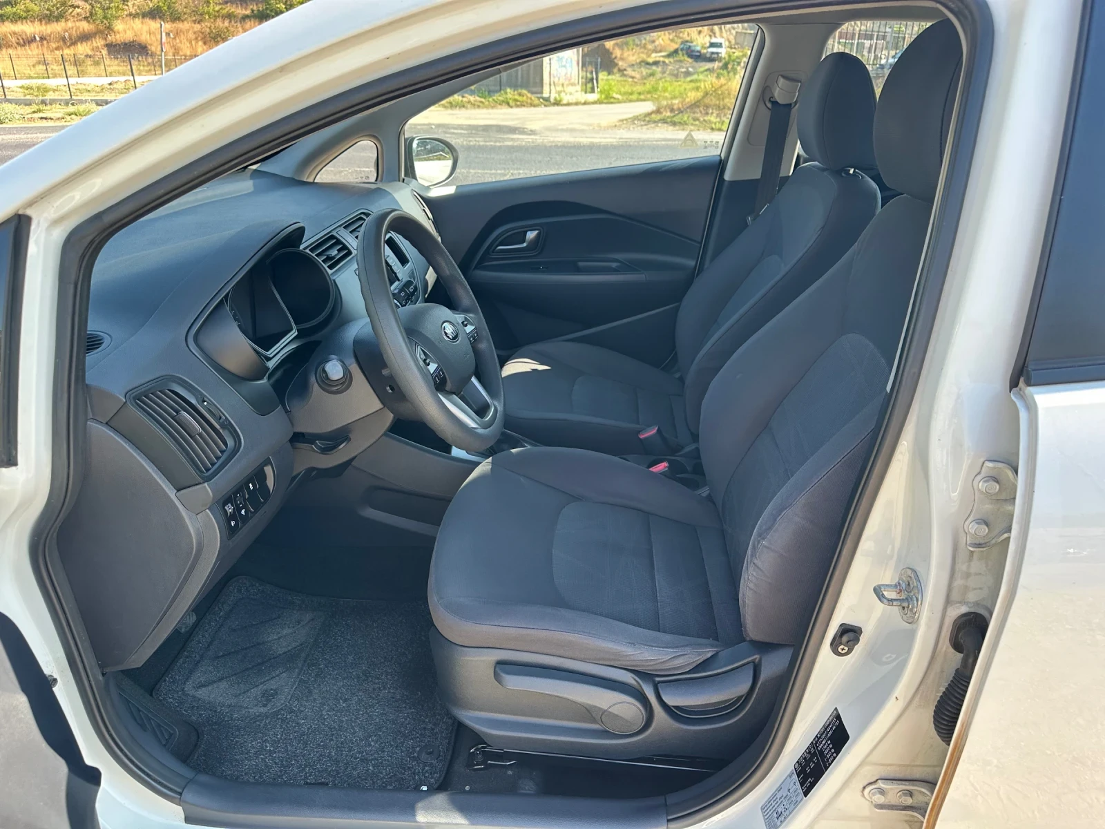 Kia Rio 1.25i 85ph EURO5B, снимка 13 - Автомобили и джипове - 55641296