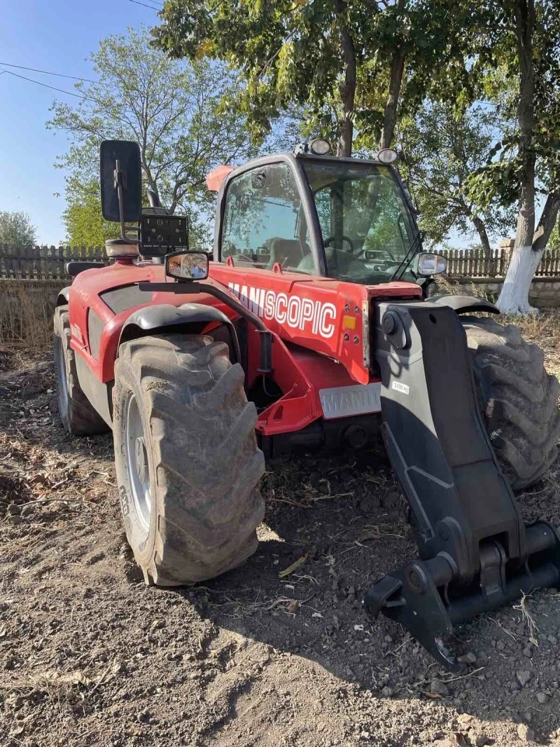 Телескопичен товарач Manitou 731, снимка 1 - Селскостопанска техника - 42627330