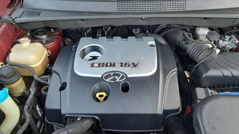 Hyundai Tucson 2.0CRDI -AUTOMATIC, снимка 12 - Автомобили и джипове - 51354900