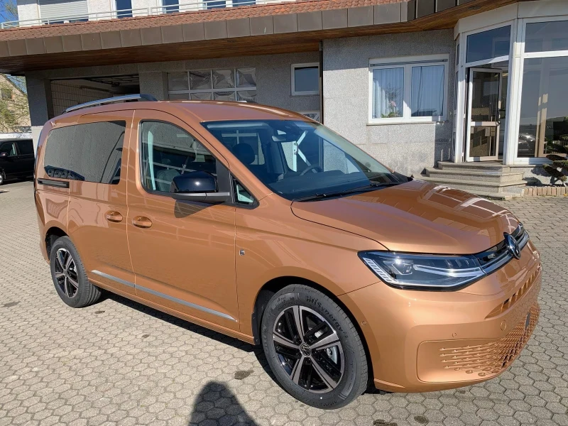 VW Caddy 7 места