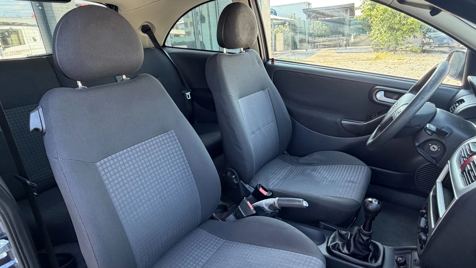 Opel Corsa 1.2 TWINPORT, снимка 14 - Автомобили и джипове - 54515545