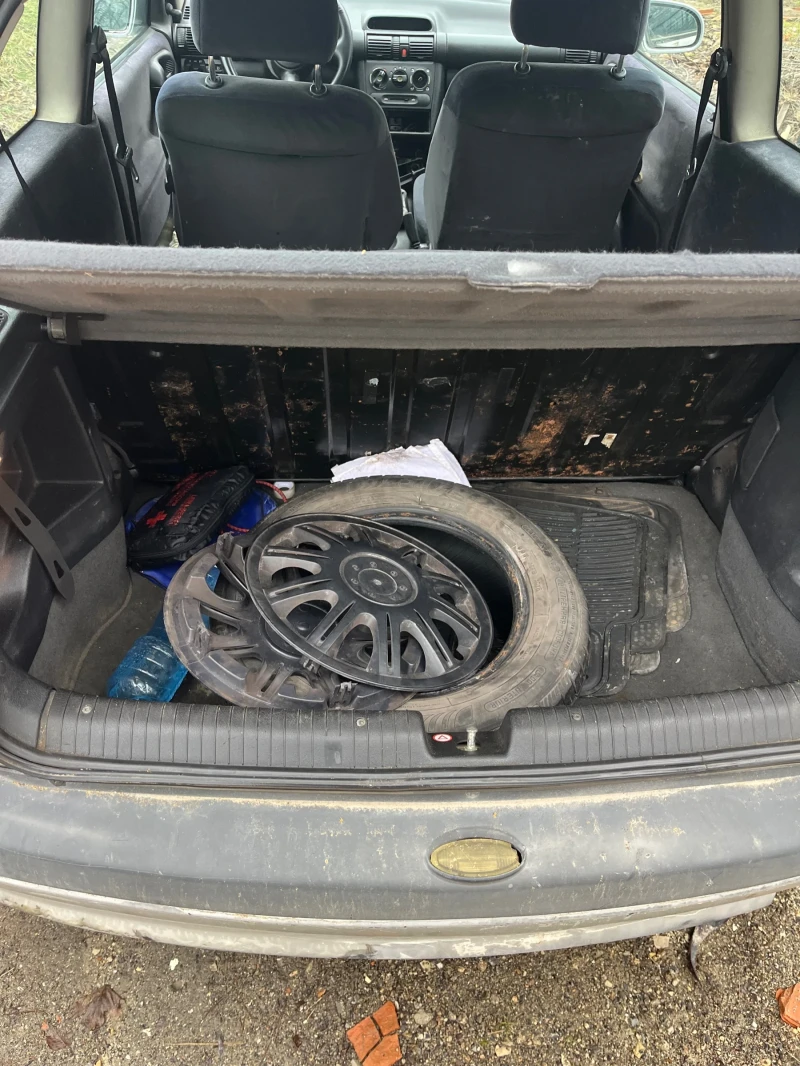 Opel Corsa 1.2i климатик, снимка 5 - Автомобили и джипове - 53556333