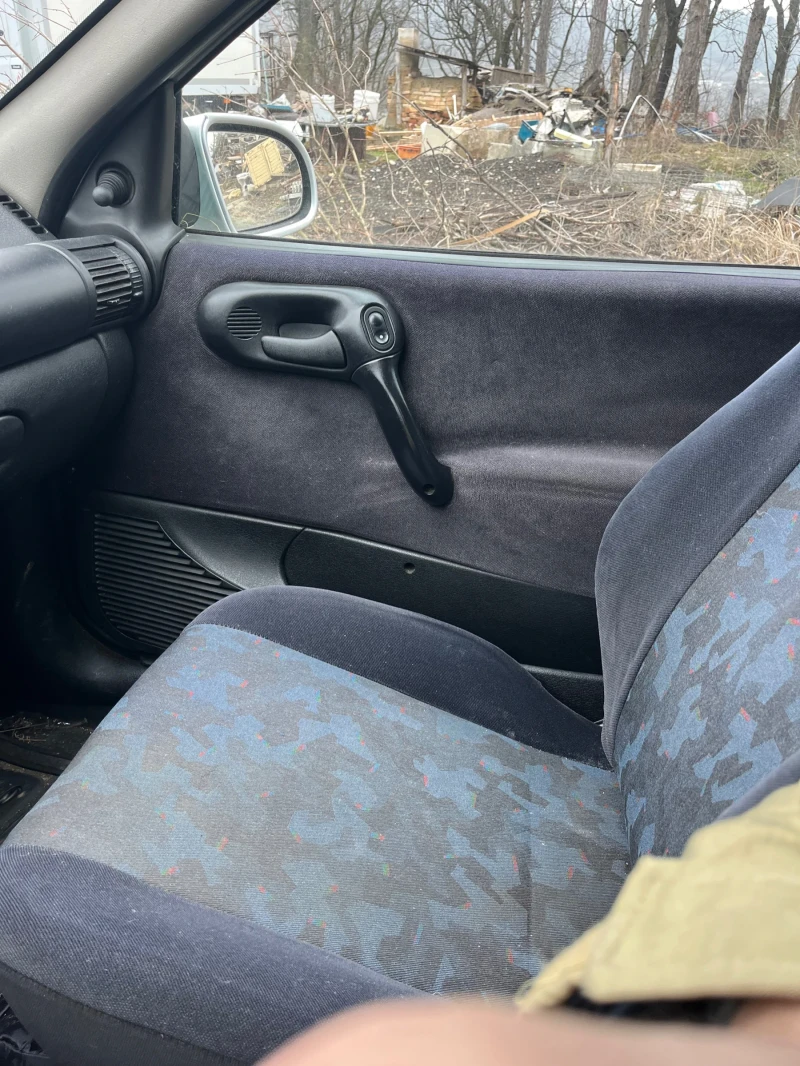 Opel Corsa 1.2i климатик, снимка 8 - Автомобили и джипове - 53556333