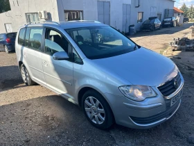 VW Touran 1.9TDI 105 BXE 6ck. NAVI | Mobile.bg    2