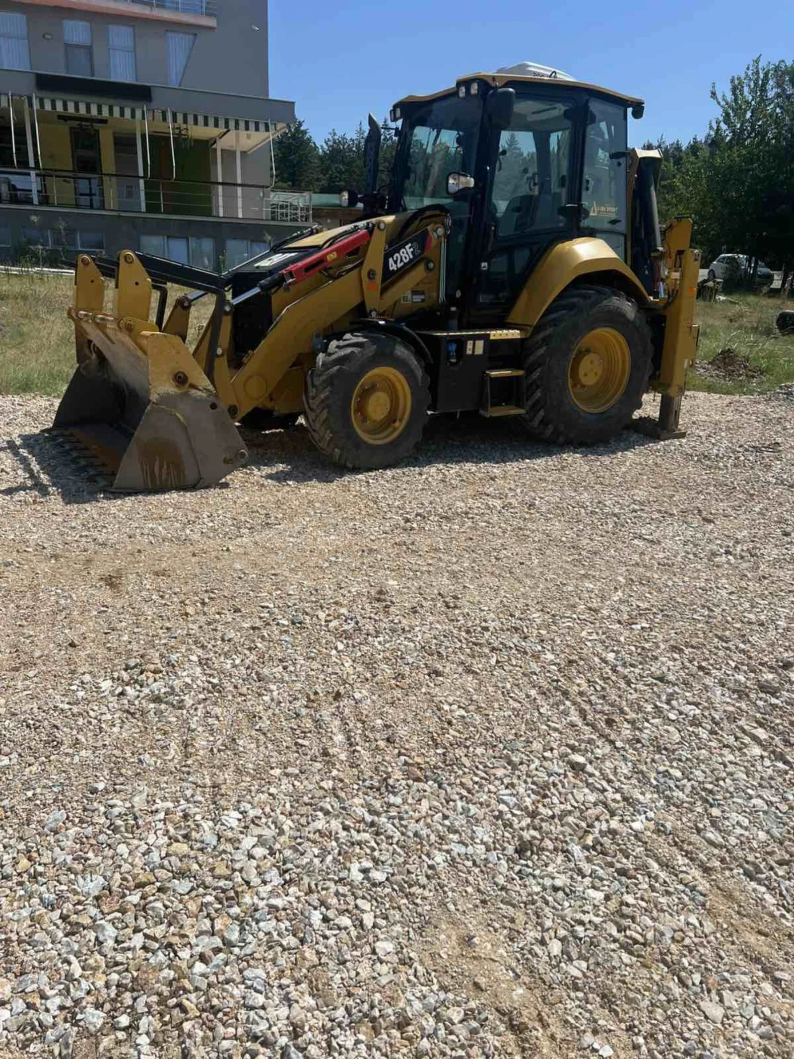 Багер Cat 428F