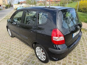 Honda Jazz 1.4 83к.с всички екстри за модела  | Auto.bg — изображение 6