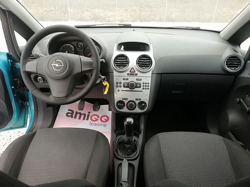 Opel Corsa 1.2i klima , снимка 13 - Автомобили и джипове - 48813032