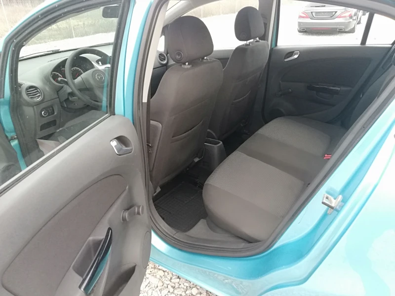 Opel Corsa 1.2i klima , снимка 10 - Автомобили и джипове - 48813032