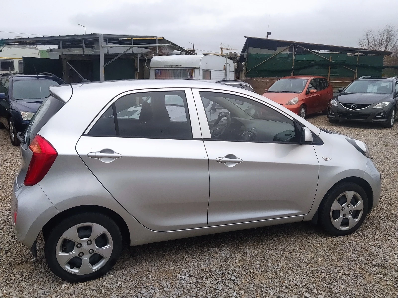 Kia Picanto 1.0i/Swiss - изображение 5