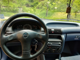 Opel Astra 1.4 (14nv), снимка 11 - Автомобили и джипове - 45540418