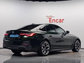 ������ BMW i4