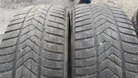 Гуми Зимни 245/45R18, снимка 1