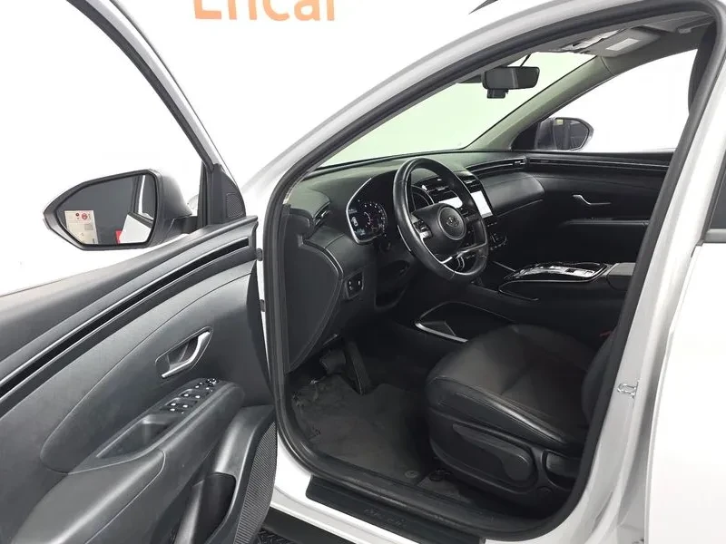 Hyundai Tucson 2.0 2WD PREMIUM, снимка 10 - Автомобили и джипове - 56293238
