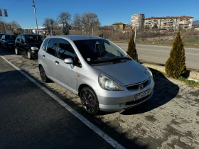     Honda Jazz 1.4   ,   