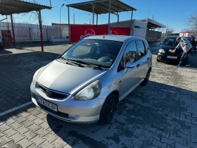     Honda Jazz 1.4   ,   