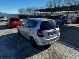     Honda Jazz 1.4   ,   