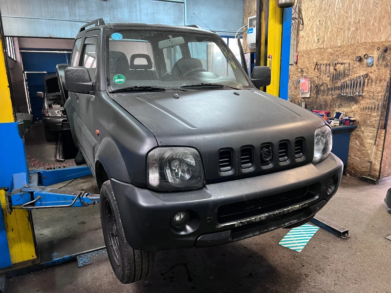 Suzuki Jimny 1.3i, снимка 1 - Автомобили и джипове - 25306127