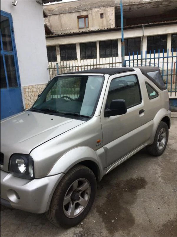 Suzuki Jimny 1.3i, снимка 7 - Автомобили и джипове - 25306127