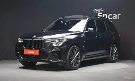BMW X7 * M50i Frozen Black Edition 6STR * АВТОКРЕДИТ* , снимка 1