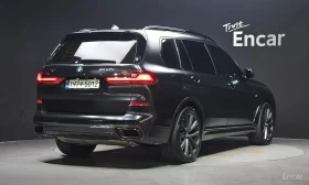 BMW X7 * M50i Frozen Black Edition 6STR * АВТОКРЕДИТ*  | Auto.bg — изображение 2