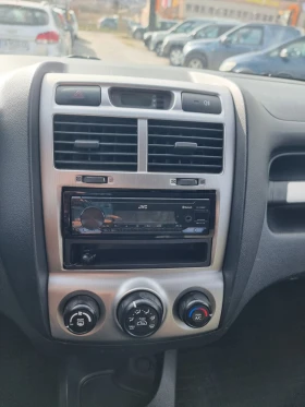 Kia Sportage 2.0i ГАЗ 4x4 КЛИМАТИК, снимка 11